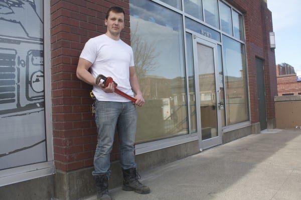 Tokar strikes a proletariat pose outside the future home of Vostok Dumpling House (Image: CHS)